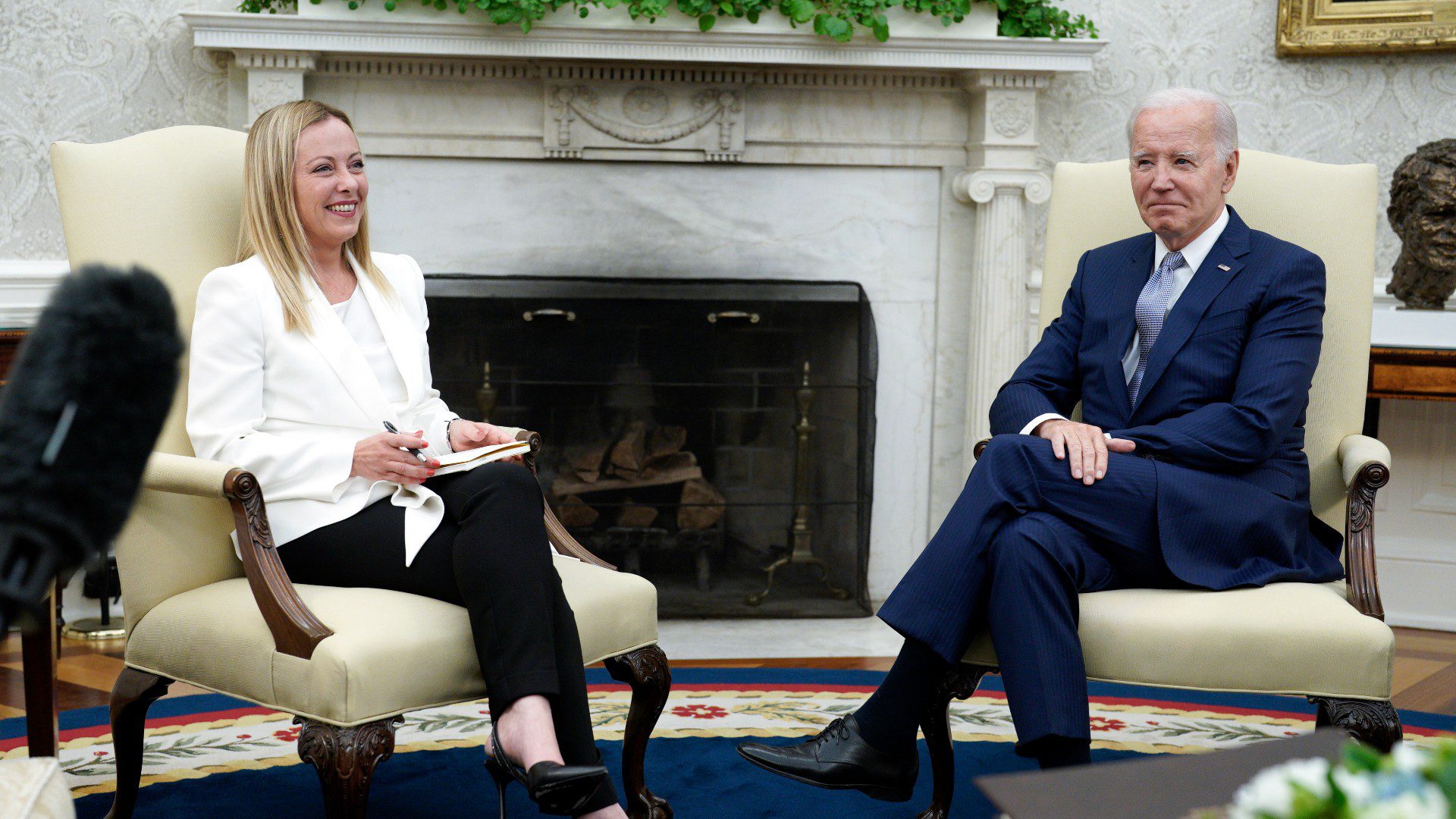 Giorgia Meloni y Joe Biden (EFE)