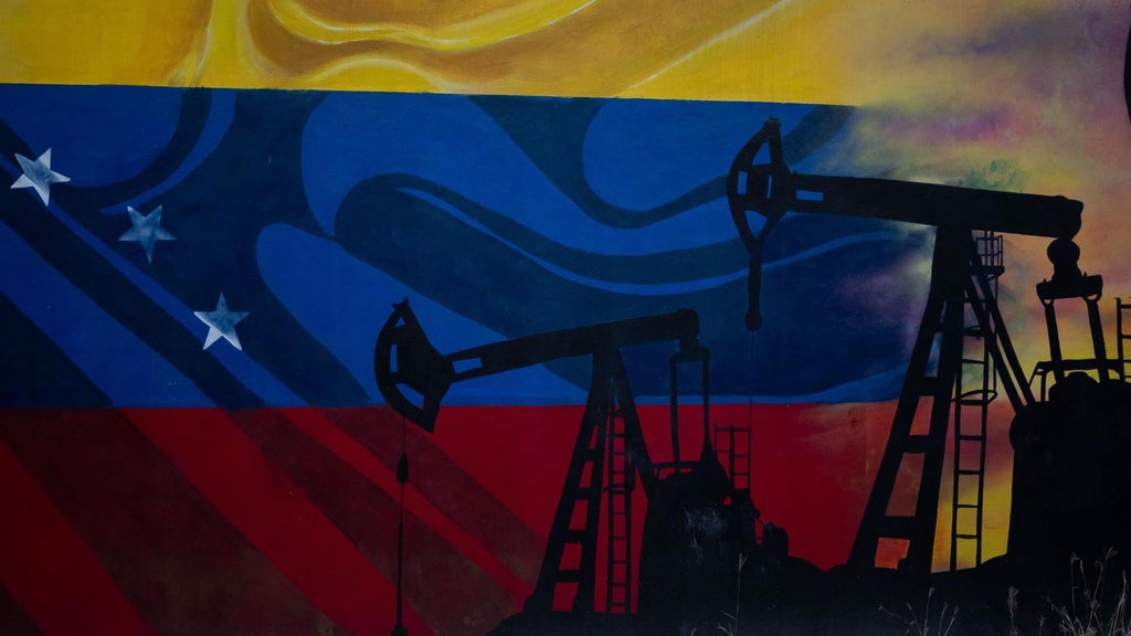 Mural en el edificio cercano a la estatal petrolera venezolana PDVSA - Foto: EFE
