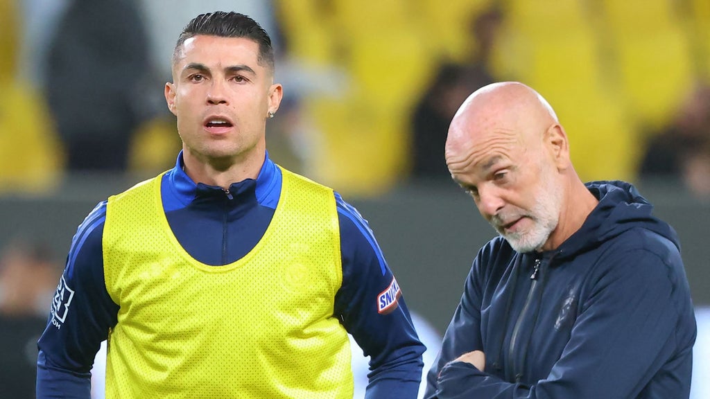 Cristiano Ronaldo y Stefano Pioli - Foto AFP
