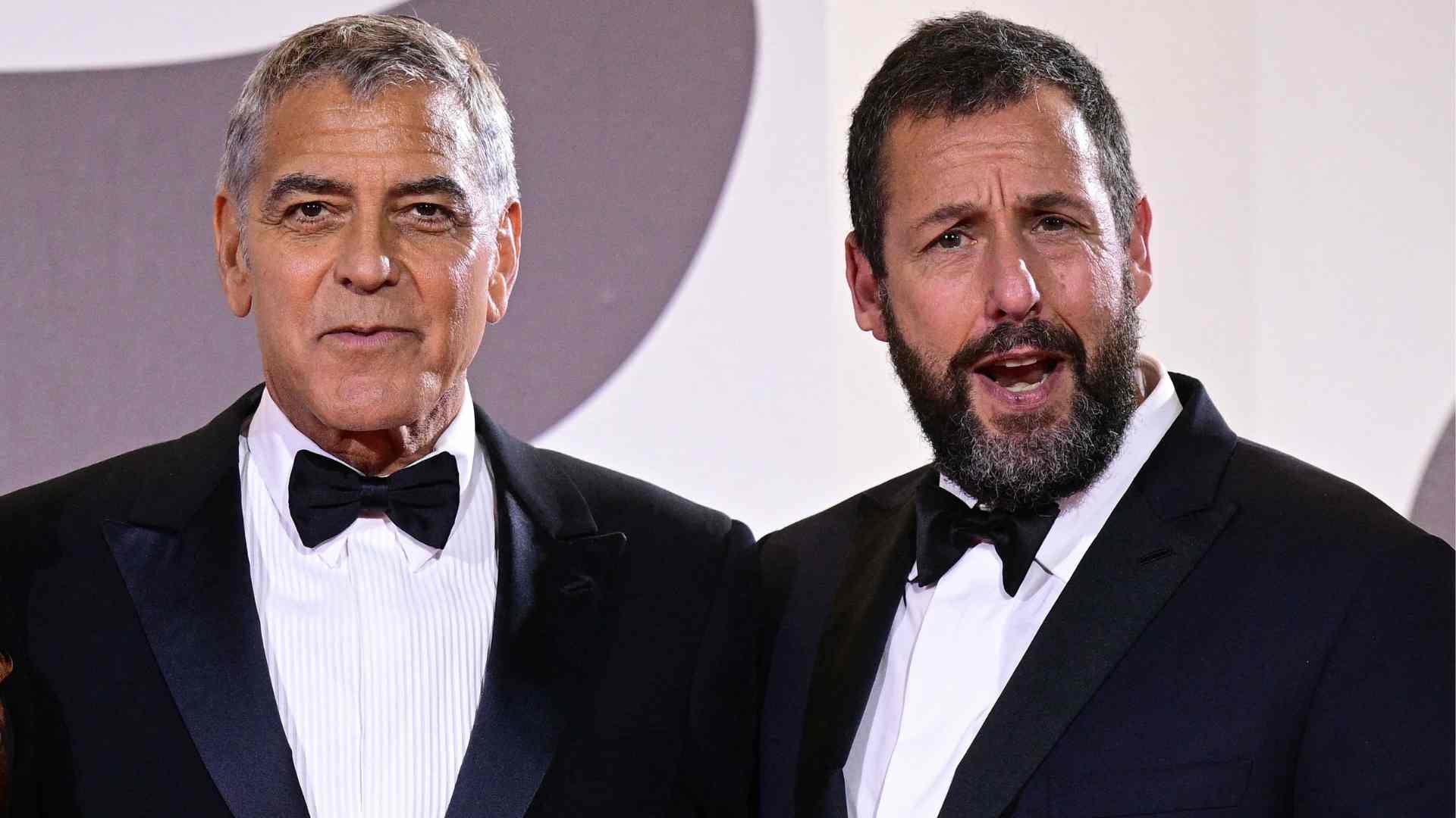 George Clooney y Adam Sandler - AFP