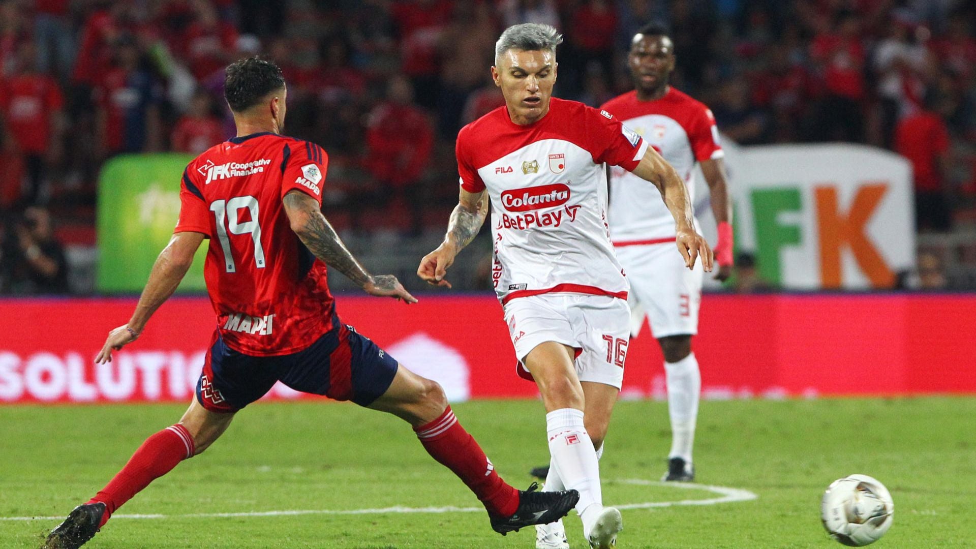 Jugadores del DIM e Independiente Santa Fe - Foto: EFE