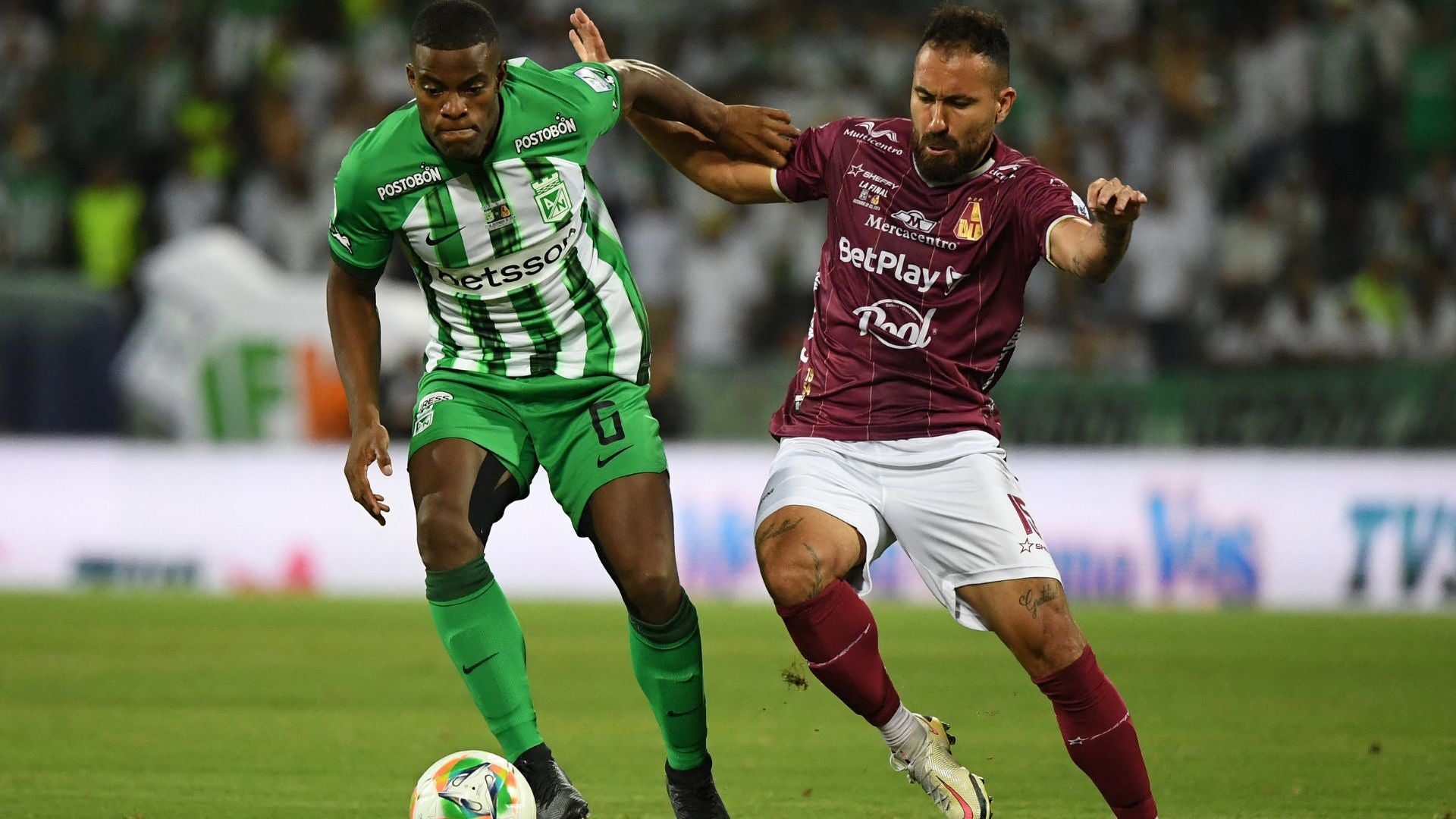 Andrés Felipe Román (Atlético Nacional) y Juan Pablo Nieto (Deportes Tolima) - Foto: AFP