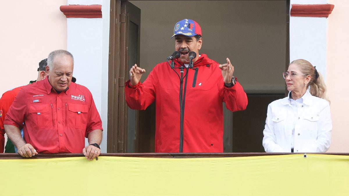Diosdado Cabello, Nicolás Maduro y Cilia Flores (AFP)