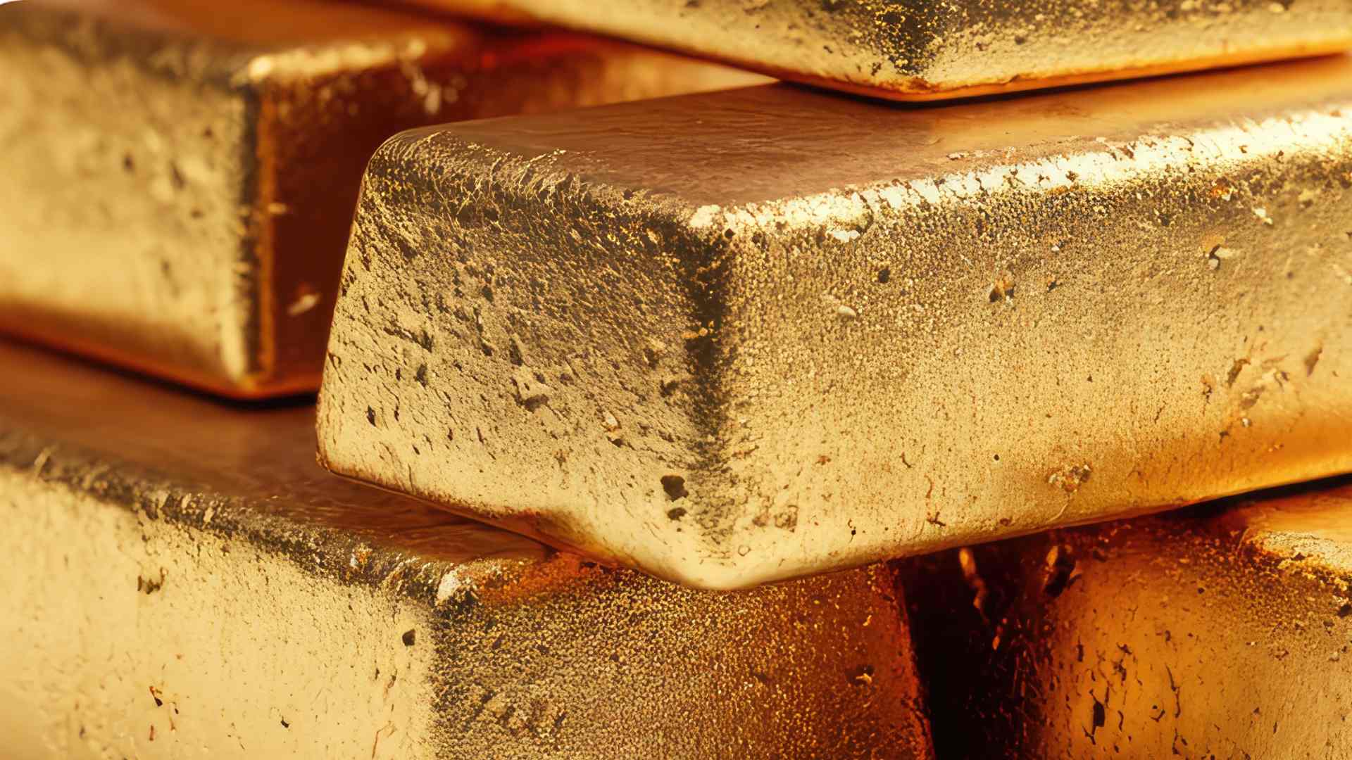 Lingotes de Oro - Canva