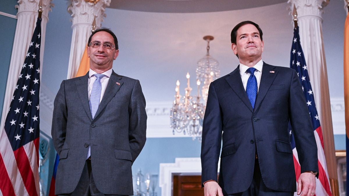 José Manuel Restrepo y Marco Rubio (AFP)
