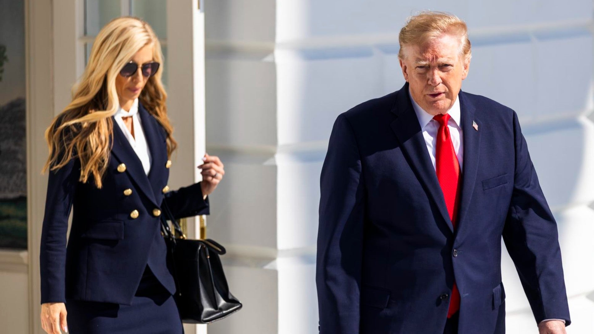Katie Zacharia y Donald Trump / FOTO - EFE