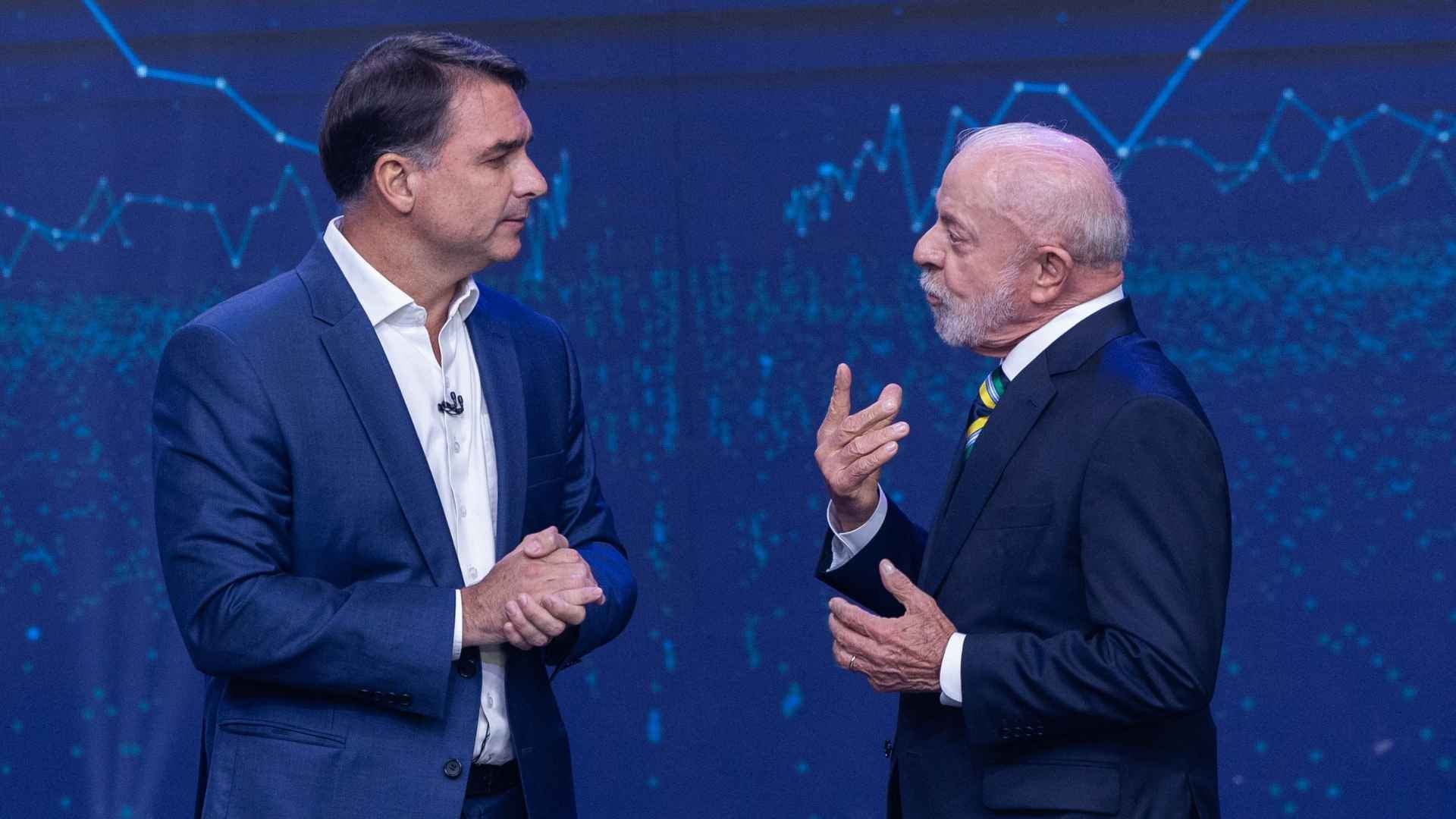 Flávio Bolsonaro y Luiz Inácio Lula Da Silva - Foto AFP