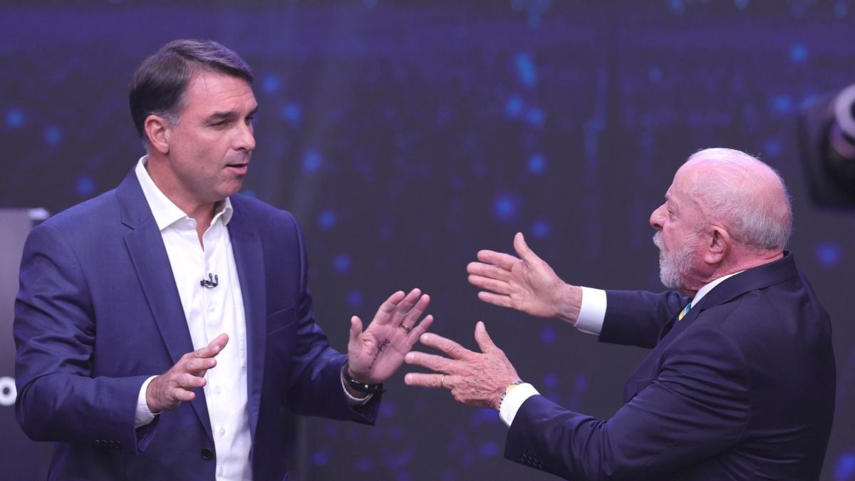 Flávio Bolsonaro y Lula da Silva (EFE)
