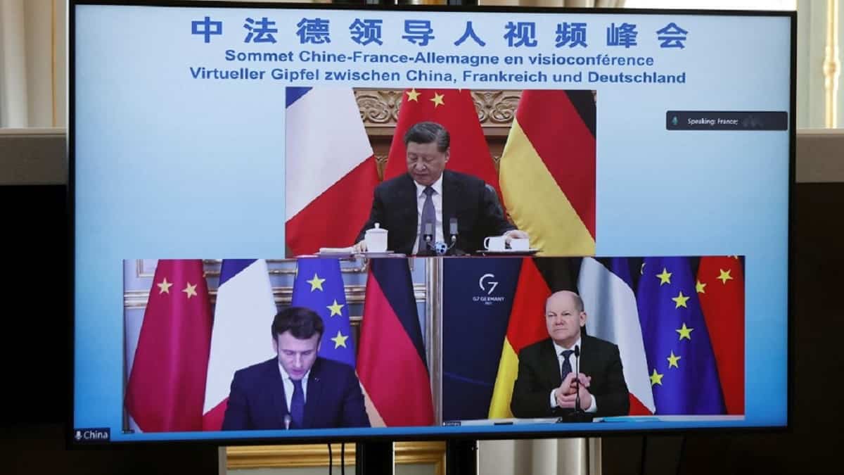 Emmanuel Macron, Olaf Scholz y Xi Jinping